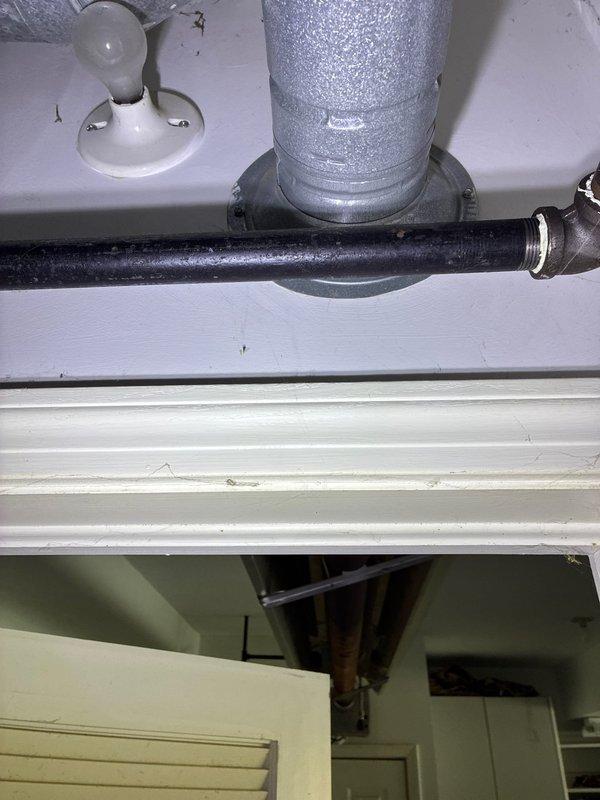 Replaced non-functional garage heating unit with new system, including installation of properly sealed metal ductwork with appropriate elbow joints and mounting brackets. Connected new refrigerant lines with proper insulation and installed necessary plumbing components to ensure optimal system performance.