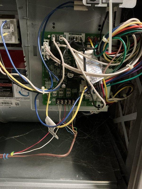 Performed routine heating system maintenance including electrical component inspection and static pressure testing. Circuit board connections were verified intact with no loose wires, and system pressure readings were measured at 36.4 (within normal operating parameters) using Klein Tools digital manometer.