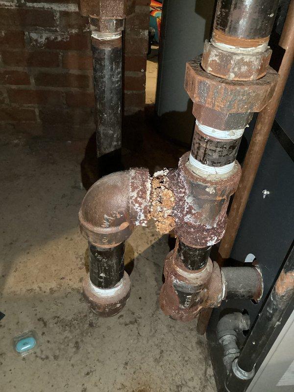 Completed replacement of sight glass kit due to protective rods being rusted in place, preventing removal of original glass. Re-piped Hartford loop which exhibited significant rust buildup and active leakage, as documented in service photos.