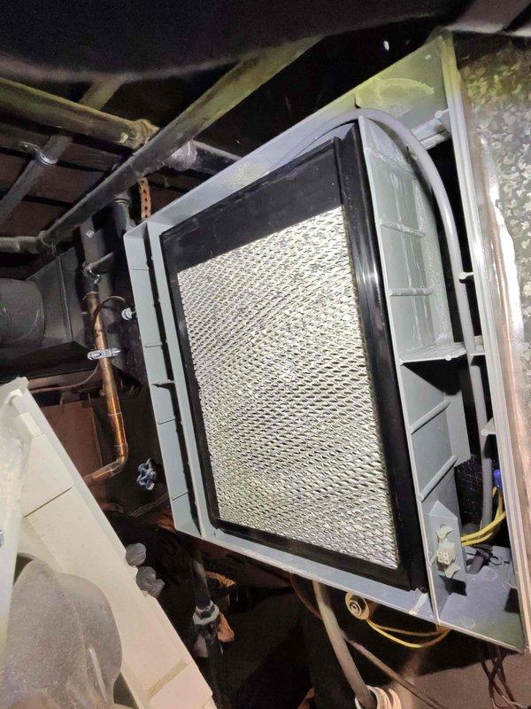 Replaced damaged condensate feed tube and drain pan on HVAC system to prevent water leakage and potential structural damage. Verified proper drainage path and confirmed system operation after installation.