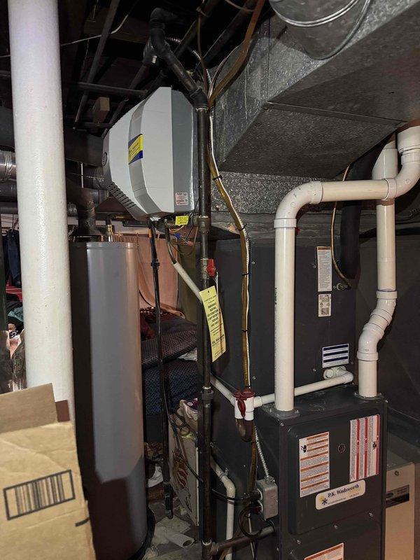 Replaced damaged condensate feed tube and drain pan on HVAC system to prevent water leakage and potential structural damage. Verified proper drainage path and confirmed system operation after installation.