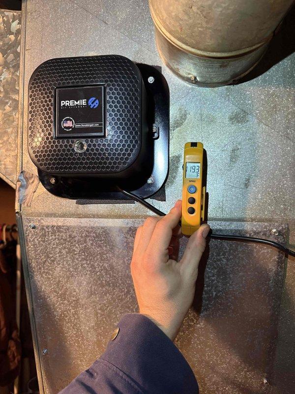 Performed routine heating system maintenance inspection. Examined blower wheel assembly for cleanliness and proper operation. Conducted CO measurements with readings of 19.3 PPM at the Premie air quality monitor, confirming system is operating within acceptable parameters.