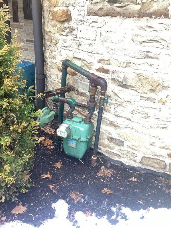 Responded to service call for generator failure after power outage. Inspection revealed debris accumulation around exterior utility connections. Cleared obstructions from generator gas supply line and restored proper functionality to automatic transfer system.