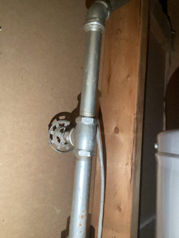 Conducted comprehensive inspection of bathroom plumbing system, examining bathtub fixtures and wall-mounted faucet assembly. Evaluated condition of galvanized metal supply pipes with particular attention to valve connections and potential oxidation points. No immediate issues requiring repair were identified during this preventative maintenance service.