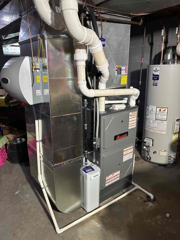 Successfully completed a comprehensive HVAC installation including a 96% efficient furnace, humidifier, and 50-gallon hot water tank in the customer's utility room. All components were properly connected with appropriate ducting, PVC venting, and copper plumbing lines according to industry standards, with the system fully tested and operational upon completion.