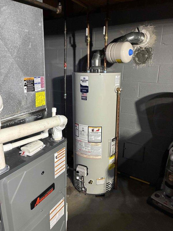 Successfully completed a comprehensive HVAC installation including a 96% efficient furnace, humidifier, and 50-gallon hot water tank in the customer's utility room. All components were properly connected with appropriate ducting, PVC venting, and copper plumbing lines according to industry standards, with the system fully tested and operational upon completion.
