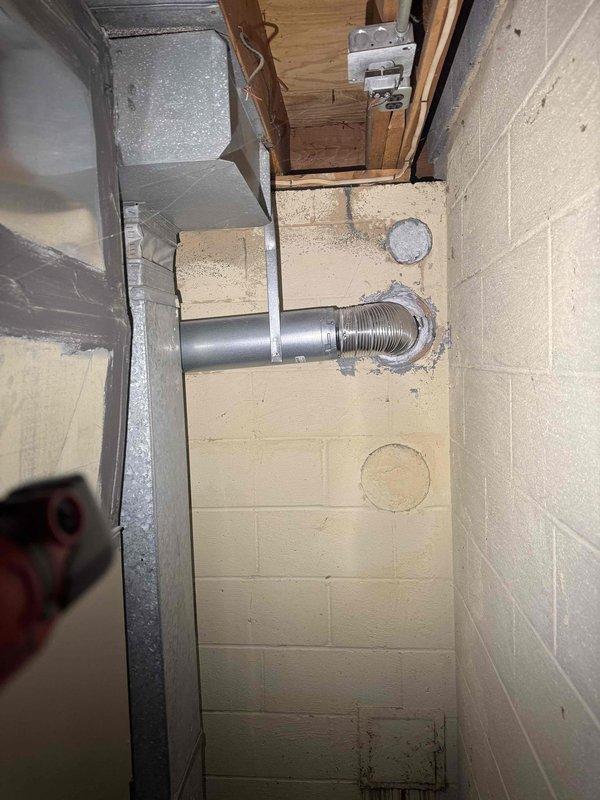 Performed routine heating maintenance on furnace system. Cleaned interior components with abrasive pad, focusing on blower housing and fan assembly. Inspected ductwork, ventilation piping, and electrical connections in utility area; all components functioning properly with no issues identified.