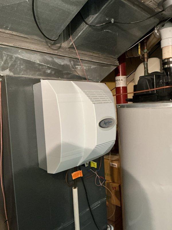 Completed routine seasonal heating maintenance on residential HVAC system including inspection of Aprilaire whole-home humidifier and furnace electrical components. Replaced air filters and verified proper connections of all wiring and PVC ventilation components, ensuring system is operating at optimal efficiency for the heating season.