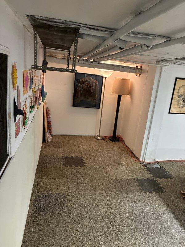 Completed warranty service by removing expired expansion tank from previous installation, requiring two technicians for approximately two hours. Observed and noted that third floor radiators require additional bleeding to ensure proper system function.