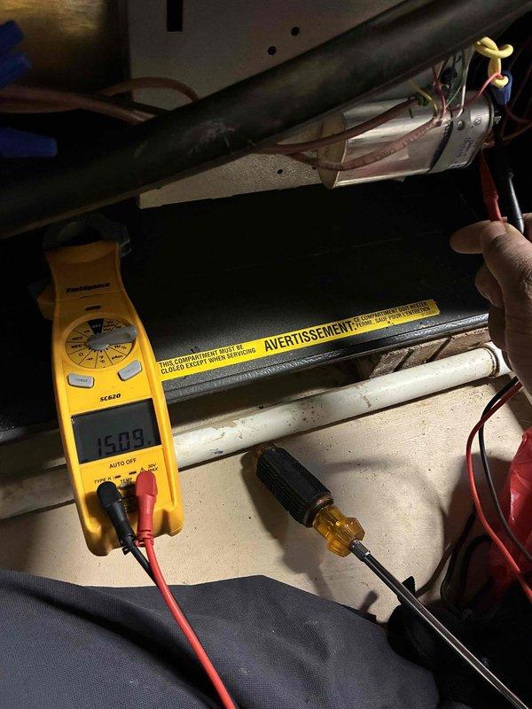 Performed scheduled heating system maintenance on furnace unit. Conducted electrical diagnostics with multimeter showing 409 ohms reading on heating element, and verified proper operating temperature of 36.8°F at supply register. Observed and documented rust formation at register requiring future attention.