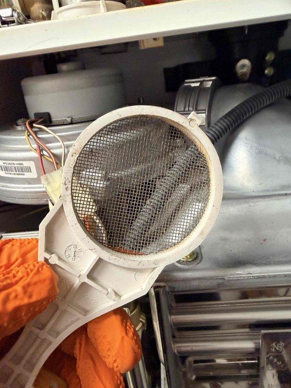 Performed comprehensive boiler maintenance inspection including pressure system verification (0-100 psi gauge reading normal), circulation pump assessment, and examination of all control valves and piping connections. Cleaned and inspected air intake filter which showed moderate debris accumulation. System currently operational but documented findings for disclosure purposes related to pending property sale.