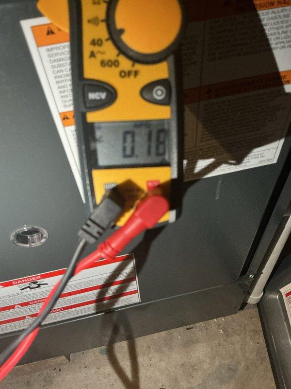 Performed scheduled monthly heating maintenance on two systems. Conducted electrical testing using clamp meter to verify proper amperage readings (0.10A) on primary system. Inspected and confirmed proper operation of Premie monitoring device with functioning indicator light.