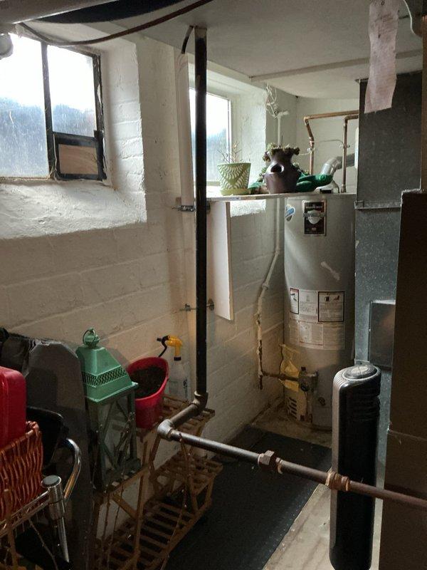 Performed scheduled heating maintenance service on residential furnace system. Conducted full inspection of the heating unit, including examination of ventilation components and PVC exhaust pipes. System was tested for proper operation with no issues detected; all connections secure and functioning normally.