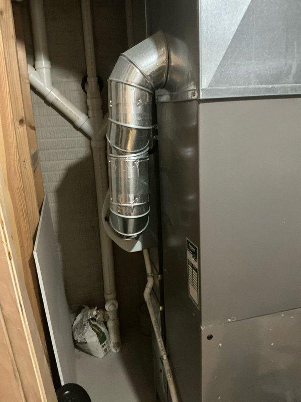 Conducted comprehensive system replacement assessment, including evaluation of existing indoor air handler/furnace with galvanized ductwork and PVC drainage components. Exterior inspection revealed current condenser unit situated on concrete pad with proper electrical disconnect and refrigerant line configuration. Prepared detailed options for complete HVAC system replacement and additional quote for new garage heating installation where no previous unit exists.