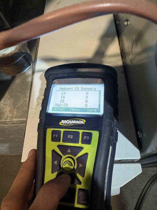 Performed routine heating system maintenance on furnace unit. Inspected and cleaned flame sensor/igniter components. Conducted carbon monoxide testing with Bacharach analyzer which confirmed zero CO readings across all measurement points, verifying proper combustion and safe system operation.