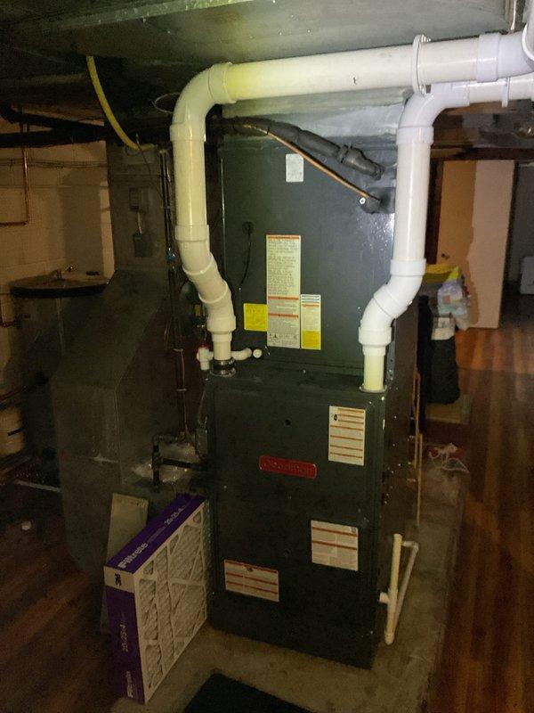 Performed first-year heating maintenance on a basement-installed furnace with PVC venting system. Inspected Honeywell controller and thermostat functionality, confirming proper operation. System appears to be in good working condition with no issues identified.