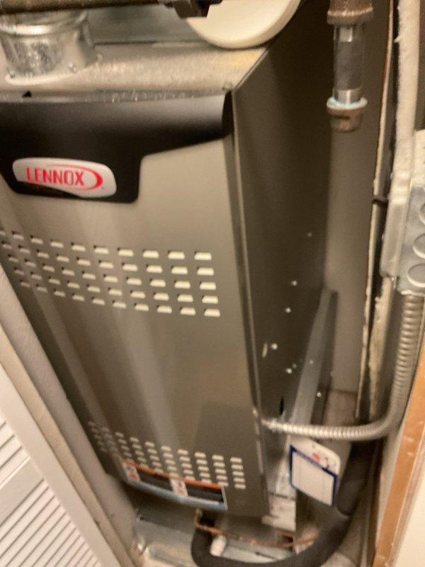 Performed scheduled maintenance service on Lennox furnace system. Inspected unit for proper operation including ventilation, electrical connections, and gas line integrity. System is functioning within normal parameters with some minor corrosion noted on copper piping near the water shut-off valve.