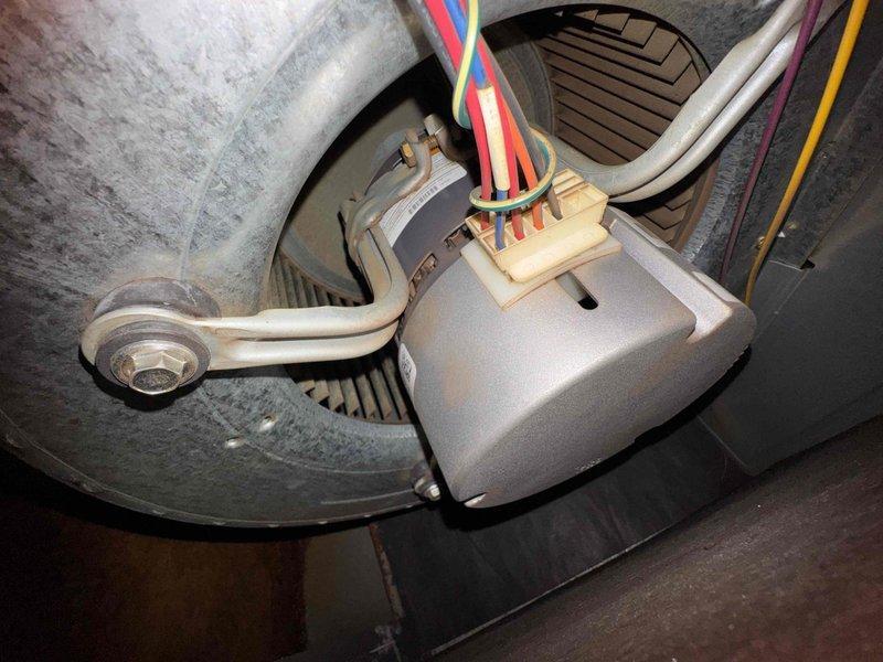 Performed routine maintenance service on residential heating system. Inspected and tested blower motor assembly and electrical connections to ensure proper operation. System appears to be functioning within normal parameters with no issues identified.