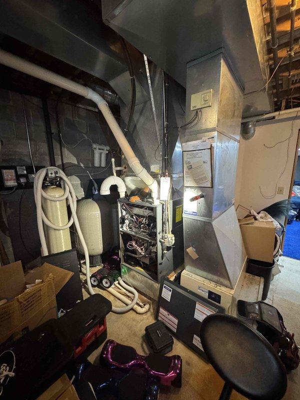 Performed routine maintenance service on residential heating system. Inspected and tested blower motor assembly and electrical connections to ensure proper operation. System appears to be functioning within normal parameters with no issues identified.