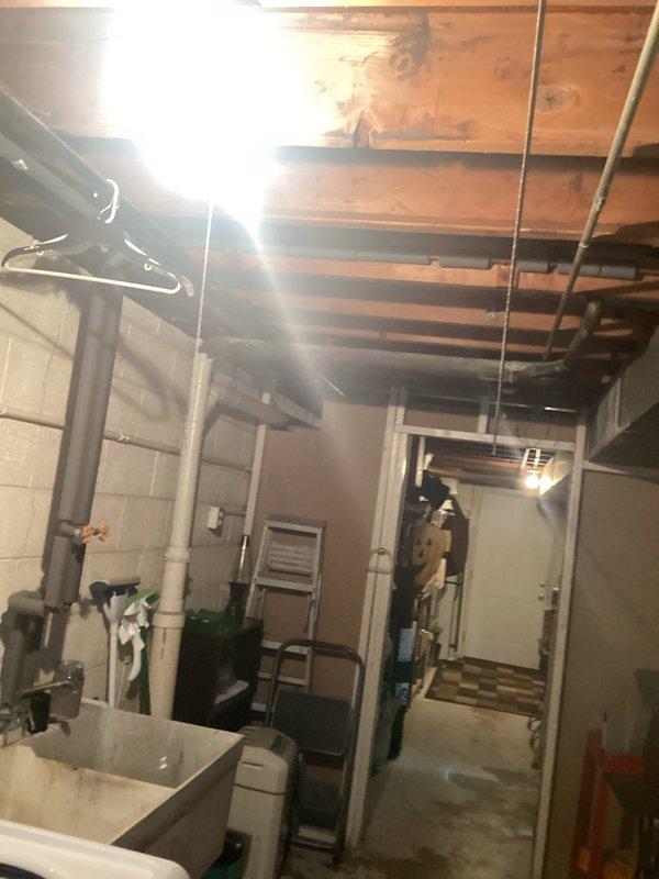 Completed circuit installation for washing machine in utility area of basement. Routed new dedicated circuit through exposed ceiling joists and connected to existing electrical panel. Tested circuit functionality to ensure proper voltage and grounding for appliance operation.
