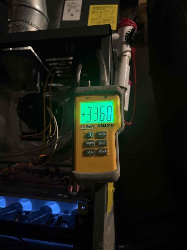 Diagnosed short cycling furnace with no heat issue that was previously serviced. Performed pressure testing with UEI EM201B meter, which indicated positive pressure reading of +3.960. Inspected and serviced the complete HVAC system including ductwork, ventilation components, and control systems to restore proper heating function.