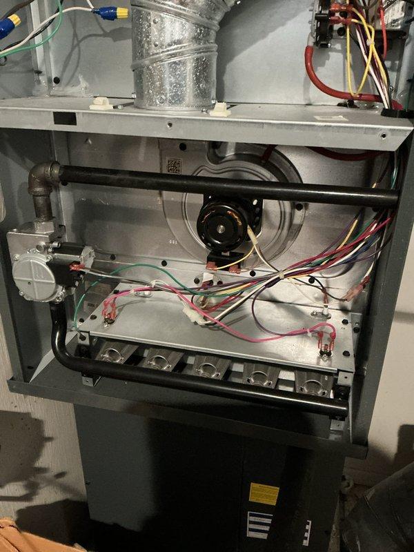 Performed scheduled preventative maintenance on furnace system. Inspected interior components including blower motor assembly, electrical connections, and burner assemblies to verify proper operation. Checked return air flow through louvered door and confirmed system is functioning according to manufacturer specifications.