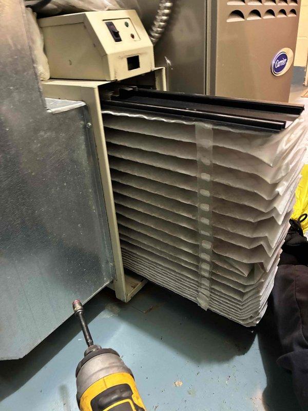 Performed heating maintenance on aging Carrier system (10+ years old). Serviced blower motor assembly and inspected electrical connections. Replaced air filter with new pleated media to restore proper airflow and system efficiency.
