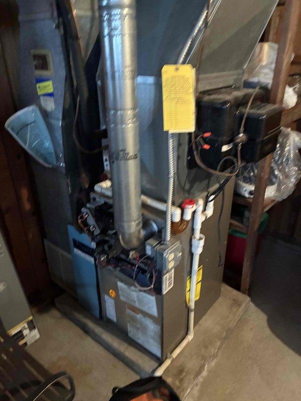 Performed scheduled preventative maintenance on residential furnace system. Inspected blower assembly and heat exchanger, finding moderate dust accumulation on ventilation components. Cleaned fan blades and air intake grills to ensure proper airflow and system efficiency.