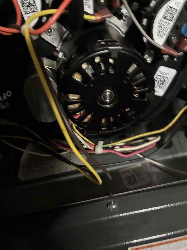 Performed routine maintenance on heating system including inspection of motor assembly and wiring connections. Checked and documented condition of air filter, which appeared to be clean and properly installed in the ventilation system. All components functioning normally with no issues identified.