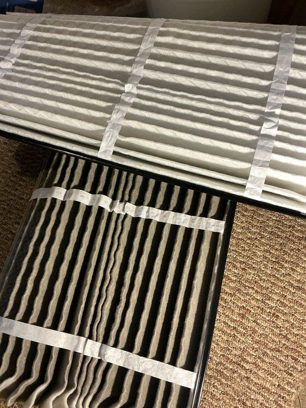 Performed scheduled heating maintenance on furnace system. Inspected and replaced air filters with new pleated filters to ensure proper airflow. Examined complete HVAC setup including furnace, humidifier, and associated PVC venting system - all components functioning normally with no issues detected.