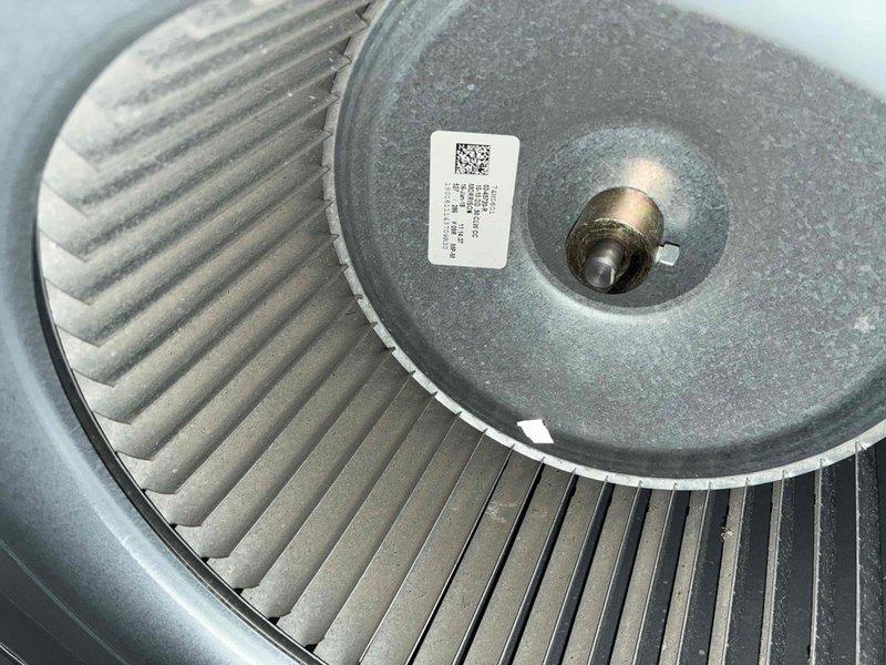 Completed dual system heating maintenance service. Inspected circuit board and electrical connections in control system, noting proper wire connections and component functionality. Examined blower wheel assembly which showed normal dust accumulation but remains in serviceable condition with no immediate concerns.