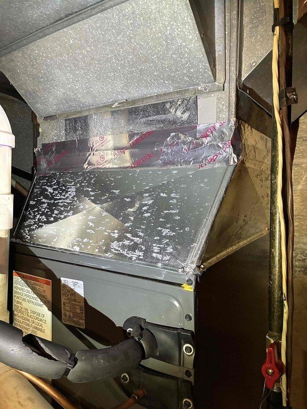 Successfully completed full HVAC system replacement with installation of a new 96% efficiency Amana furnace and matching air conditioning unit. System includes properly installed PVC ventilation pipes and condensate drainage, with all ductwork connections secured and sealed according to manufacturer specifications.