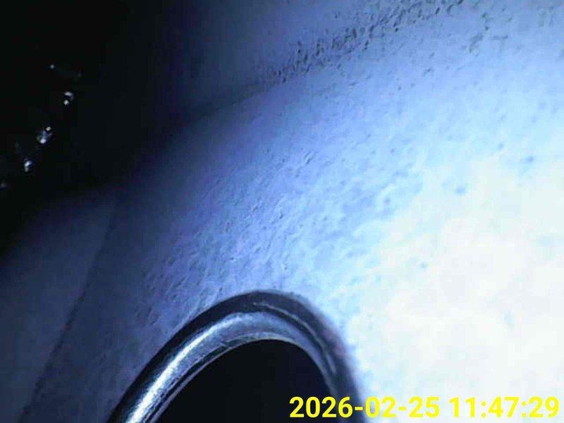 Performed comprehensive heating tune-up on HVAC system, including inspection of heat exchanger fins and ventilation components. Visual examination revealed proper condition of metal components with no visible damage or blockages in the circular duct opening. All system elements were verified to be functioning within normal parameters.