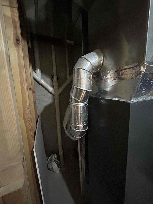 Completed installation of new 96% efficient furnace and AC complete system in basement utility area. Installation included proper connection of metal ductwork with sealed joints, connection of PVC venting system, and verification of all components. Final inspection confirmed system is operational and meets manufacturer specifications.