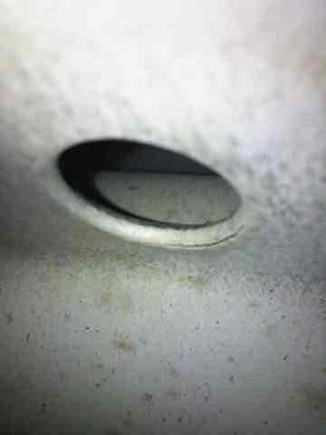 Diagnosed and repaired 15+ year old furnace exhibiting no-heat condition with blower operation but failed ignition. Inspection revealed error code on circuit board indicating ignition failure, requiring removal and cleaning of flame sensor to restore proper flame detection and system operation.