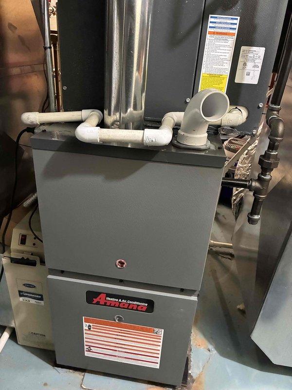 Successfully completed installation of dual 80% efficient Amana furnaces with proper PVC venting and drainage connections. Systems were fully tested and verified operational, with all safety protocols followed during the installation process.