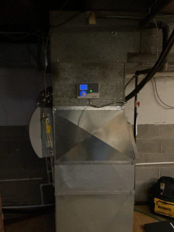 Performed routine maintenance on heating system with Aprilaire whole-house humidifier. Inspected furnace unit, checked digital control panel functionality, and verified proper connection of ductwork. System is operating within normal parameters with all connections secure.