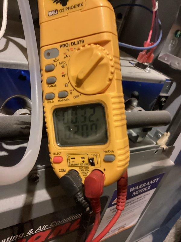 Performed scheduled first-year maintenance on heating system. Conducted electrical diagnostics using UEi Q2 PHOENIX multimeter, confirming voltage readings of 53.2V. Inspected and verified proper operation of all components including blower assembly and control board indicators, with all systems functioning within manufacturer specifications.