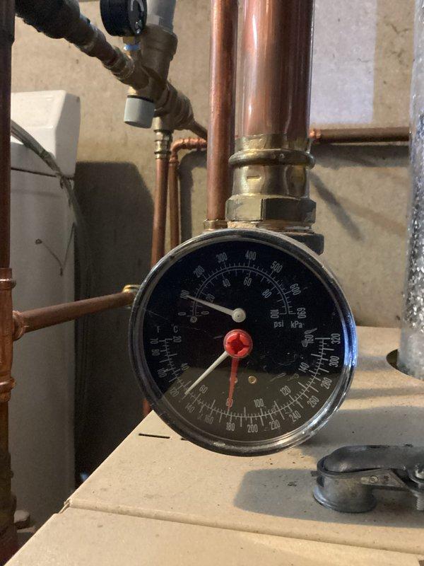 Performed scheduled boiler maintenance service, which included inspection of the mechanical room containing HVAC ductwork, copper piping system, and associated valves. Checked pressure gauge readings and verified system was operating within normal parameters, with both temperature and pressure values within acceptable ranges.