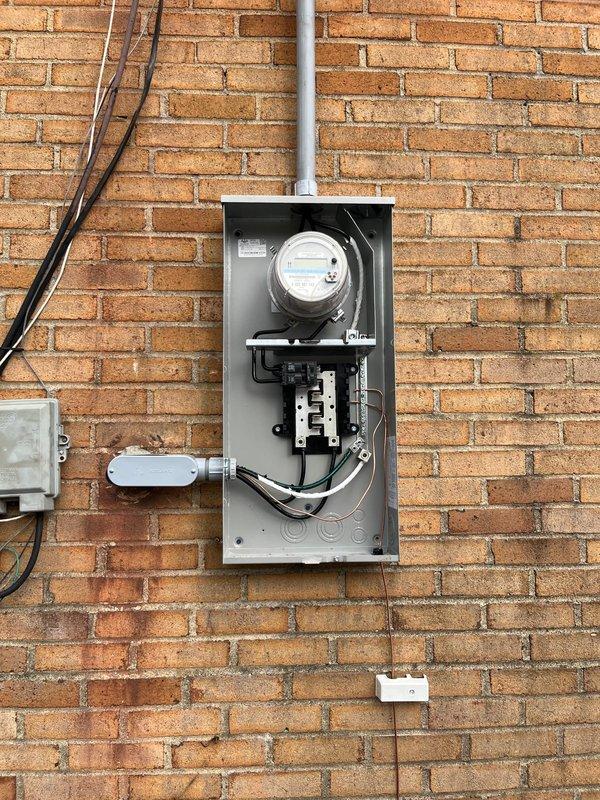 Performed inspection of Federal Pacific electrical panel and assessed installation requirements for new dedicated circuit to support tankless water heater. Documented existing service entrance configuration and current panel condition, noting multiple circuit breakers and wiring layout. Provided quote for complete panel replacement and new outlet installation as requested.