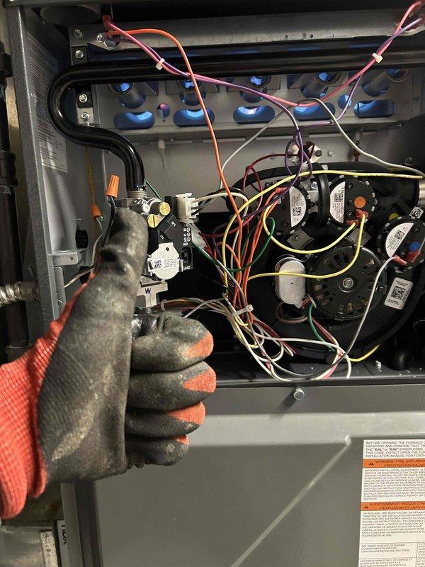 Performed warranty inspection on furnace system, identifying heavily clogged air filter causing operational issues. Accessed control board to verify proper electrical connections and component functionality, then replaced filter and cleaned accumulated debris from blower assembly.