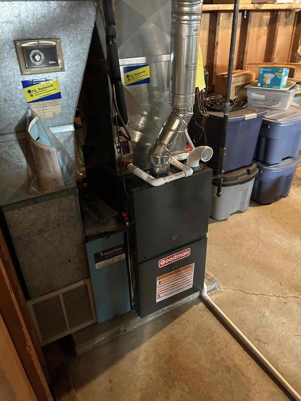Successfully installed a new Goodman 80% efficiency furnace in basement utility area, including proper connection of metal ductwork, PVC drain lines, and exhaust venting. System was fully tested and is operating according to manufacturer specifications.