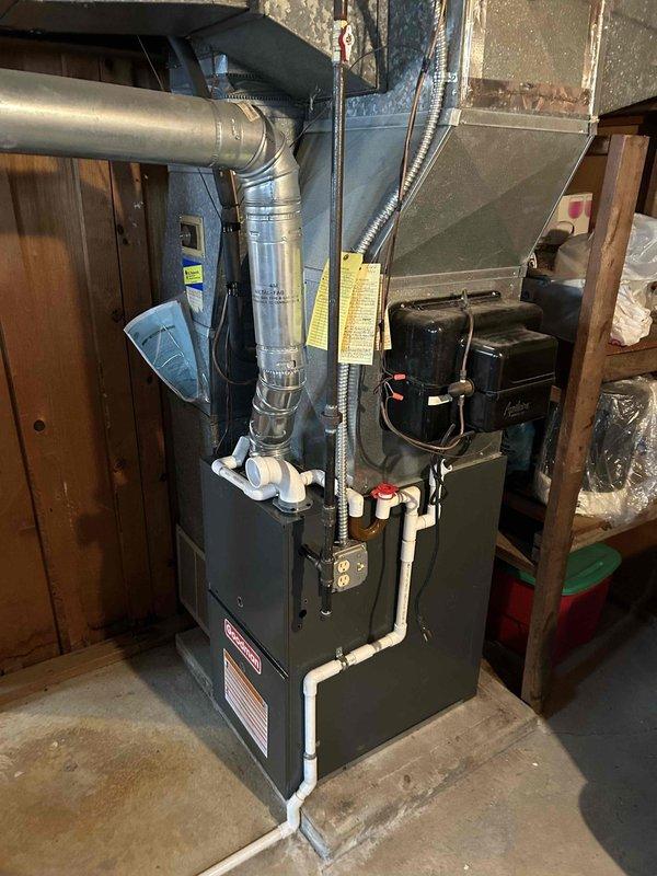 Successfully installed a new Goodman 80% efficiency furnace in basement utility area, including proper connection of metal ductwork, PVC drain lines, and exhaust venting. System was fully tested and is operating according to manufacturer specifications.