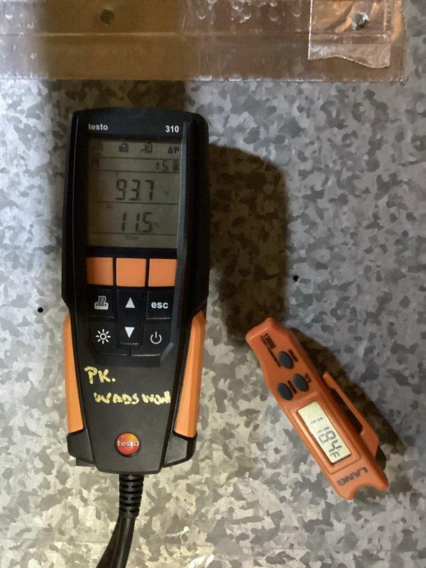 Performed scheduled heating maintenance on system. Conducted combustion analysis using Testo 310 analyzer to verify proper operation parameters (CO2/O2 levels at 937/115). Measured electrical load with UEi ammeter showing 45.85V with current draw of 0.054A, confirming system is operating within manufacturer specifications.