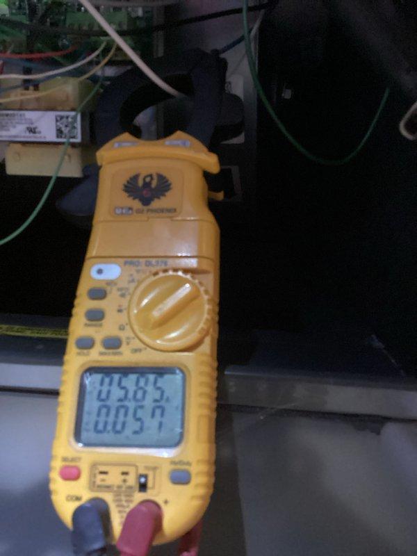 Performed scheduled heating maintenance on system. Conducted combustion analysis using Testo 310 analyzer to verify proper operation parameters (CO2/O2 levels at 937/115). Measured electrical load with UEi ammeter showing 45.85V with current draw of 0.054A, confirming system is operating within manufacturer specifications.