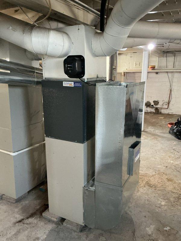 Replaced faulty thermostat and EIM unit under limited warranty. Performed system inspection of basement-installed HVAC system with proper ductwork connections. Verified proper operation of burner assembly and control wiring after installation.