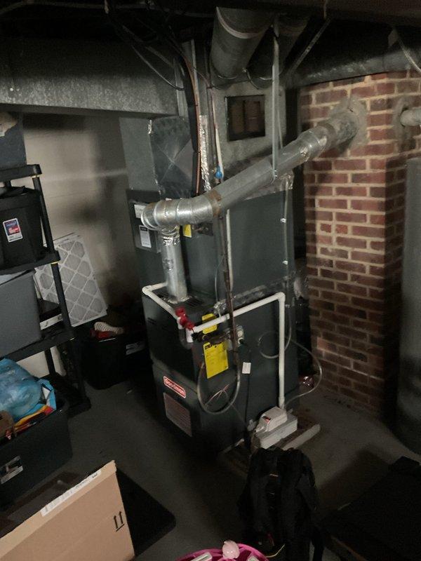 Responded to emergency no-heat call for 10+ year old gas furnace located in basement. Diagnosed issue with furnace igniting but blowing cold air; performed necessary repairs and completed scheduled maintenance service per membership agreement. System now functioning properly with proper heat output.