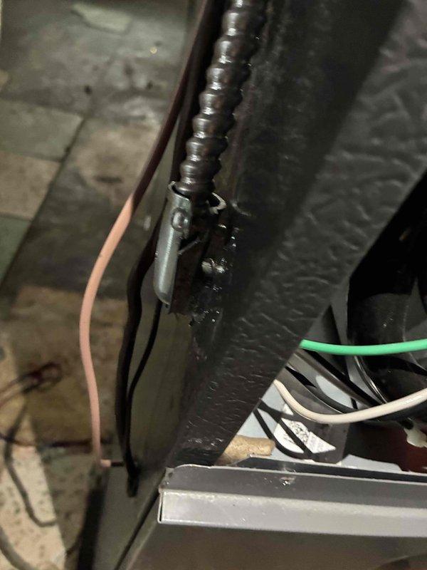 Performed annual heating maintenance on 1-year-old system. Documented non-compliant issues including loose MC fitting and unsupported EMT raceway. Photographic evidence captured for permit department submission as requested.