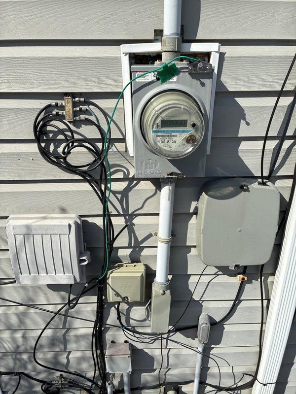 Conducted comprehensive site assessment for furnace replacement, including evaluation of existing HVAC system components and electrical service entrance. Documented current installation showing water heater proximity and existing ductwork configuration to determine optimal equipment placement and necessary modifications for new furnace installation.