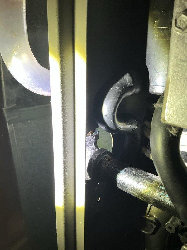 Responded to customer complaint of furnace leakage. Upon inspection, discovered a crack in the condensate drain assembly. Documented damage with photos and identified the damaged component as the source of the water leak.